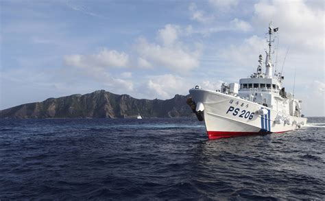 Beijing says it warned Japanese fishing boat in waters near Japan-held islands claimed by China